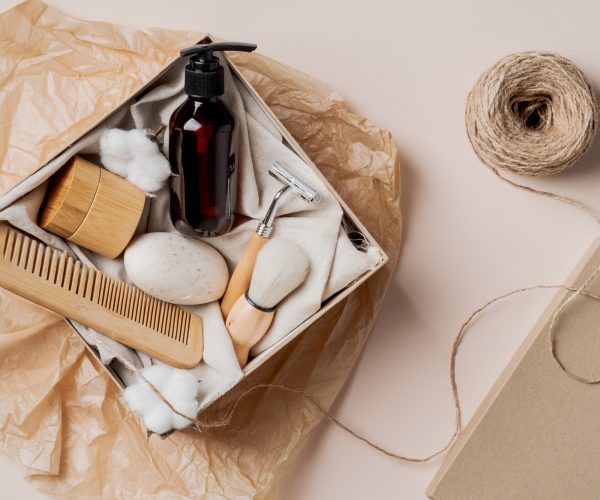 Eco-friendly SPA beauty products for personal care in cardboard box. Flat lay, top view.